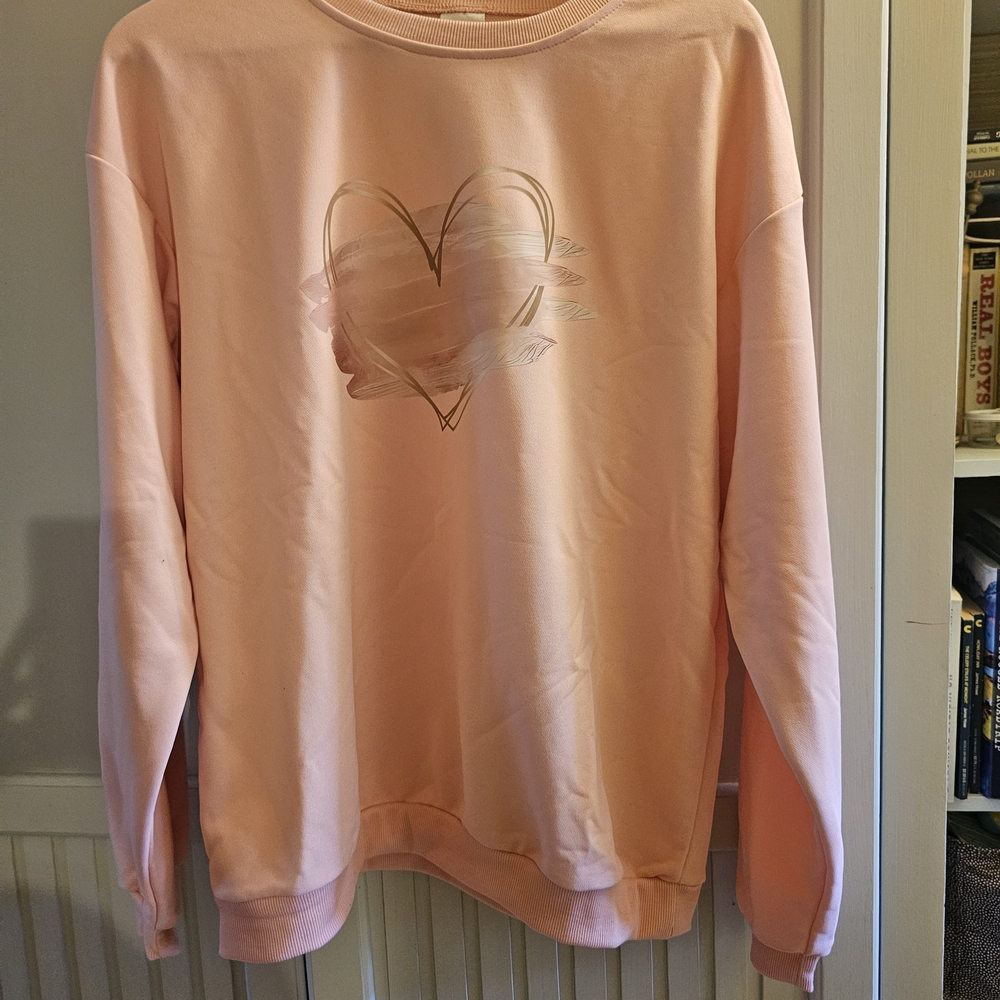 Pink Sweatshirt with Heart Design